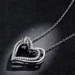 Ezüst nyaklánc dupla szíves, pillangós medállal