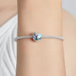 Ezüst charm, utazás