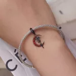 Ezüst charm, rózsa és hold