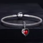 Ezüst charm, szárnyas szív