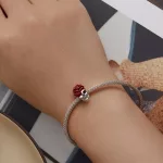 Ezüst charm, koponya