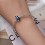 Ezüst charm, csillagos ég