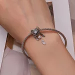 Ezüst charm,  denevér, álomfogó szív, kristállyal