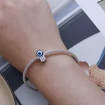 Ezüst charm,  Fatima keze, ördögszemmel