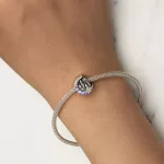 Ezüst charm, holdkastély