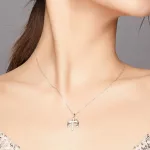 Ezüst nyaklánc, szárnyas kereszttel