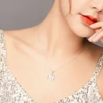 Ezüst nyaklánc, szárnyas kereszttel