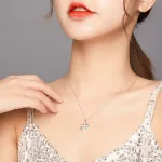 Ezüst nyaklánc, szárnyas kereszttel