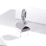 Ezüst charm, zongora