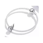 Ezüst charm, aranyhal