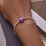 Ezüst charm, tarka szív