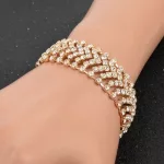 Aranyazott karkötő kristályokkal, arany színben 17+6 cm 