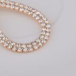 Aranyozott csepp fülbevaló kristályokkal, arany színben 