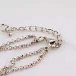 Gyöngyökkel díszített, hosszú nyaklánc, ezüst színben 