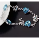 Szív és lóhere karkötő, Aquamarine, Swarovski köves