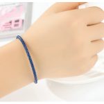 Fonott karkötő, bőr, kék, ezüst kapoccsal, 20 cm