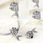 Ezüst halacska gyöngy kristálykövekkel 