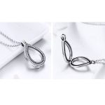 Ezüst nyaklánc nyitható, csepp alakú medállal, fehér