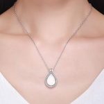 Ezüst nyaklánc nyitható, csepp alakú medállal, fehér