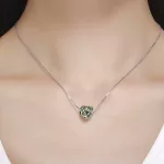 Ezüst charm, szív madárral