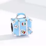 Ezüst charm, bőrönd