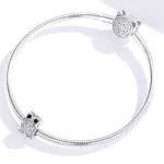 Ezüst bagoly charm