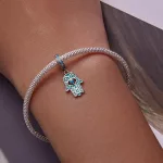 Ezüstcharm, Fatima keze