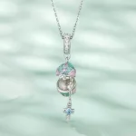 Ezüst charm, szelence
