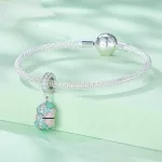 Ezüst charm, szelence