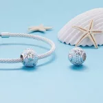 Ezüst charm, tenger