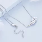 Ezüst női nyaklánc pávatollmedállal