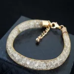 Henger alakú karkötő Swarovski kristályokkal arany