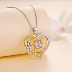 Ezüst női nyaklánc virágos szívmedállal