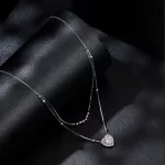 Ezüst dupla nyaklánc kristálymedállal