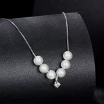 Ezüst nyaklánc gyöngyös medállal