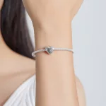 Ezüst charm 925, szív hópelyhekkel