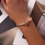 Ezüstcharm, foltos kutyus
