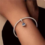 Ezüstcharm, földgömb repülővel