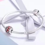 Ezüst charm csillagokkal
