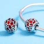 Ezüst charm csillagokkal