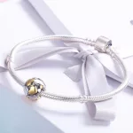 Ezüst charm szívekkel