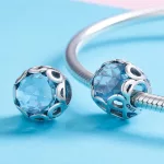 Ezüst charm 925, gyöngy kék kristállyal