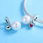 Ezüst charm 925, gyöngy szívvel