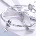 Ezüst charm 925, repülő csillagokkal