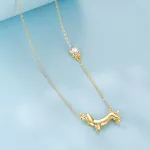 Ezüst nyaklánc tacskómedállal, aranyozott