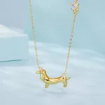 Ezüst nyaklánc tacskómedállal, aranyozott