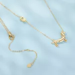 Ezüst nyaklánc tacskómedállal, aranyozott