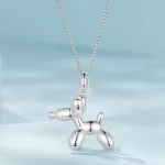 Ezüst női nyaklánc uszkármedállal