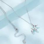 Ezüst női nyaklánc uszkármedállal